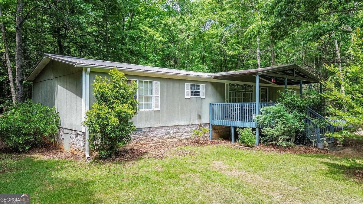 3 bedroom, 2 bathroom, 1,620 sq ft single family residence for sale at 1064 Martin Griffeth Road, Hull, GA 30646 — photo 1 of 31