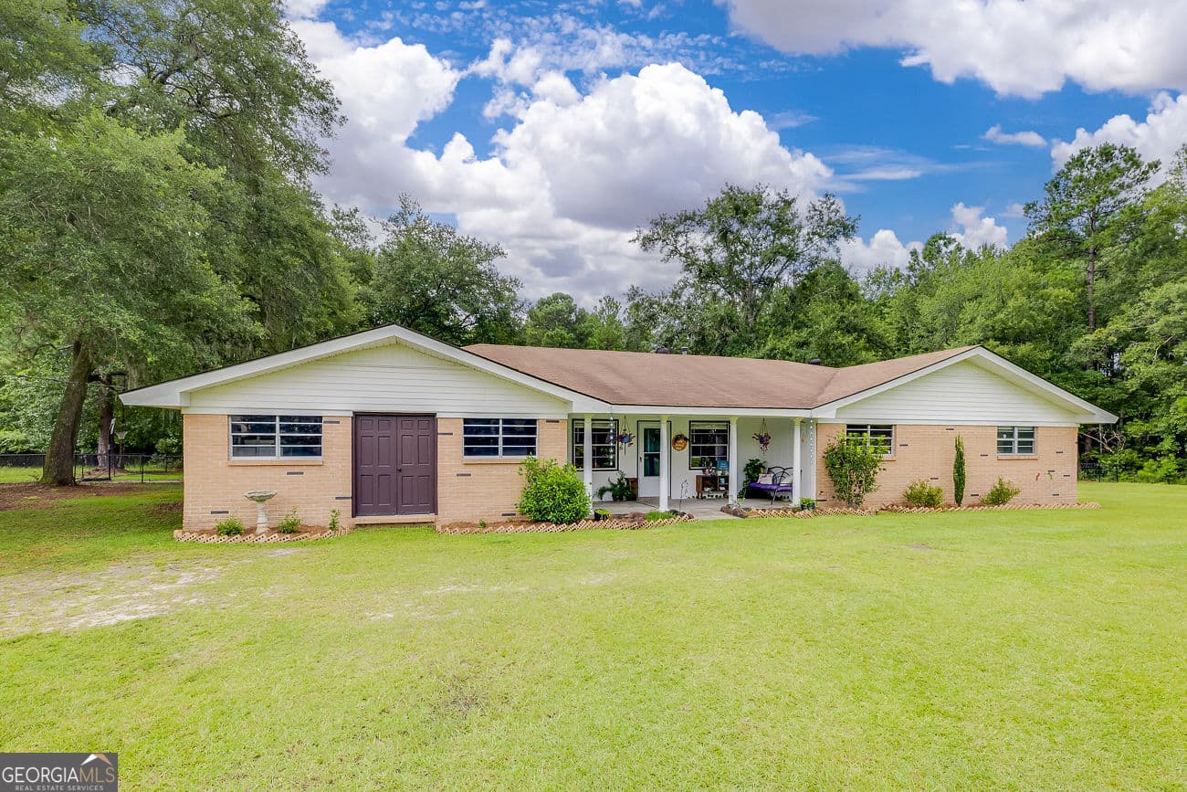 4 bedroom, 2 bathroom, 1,821 sq ft single family residence for sale at 1325 Pine Barren Road, Pooler, GA 31322 — photo 2
