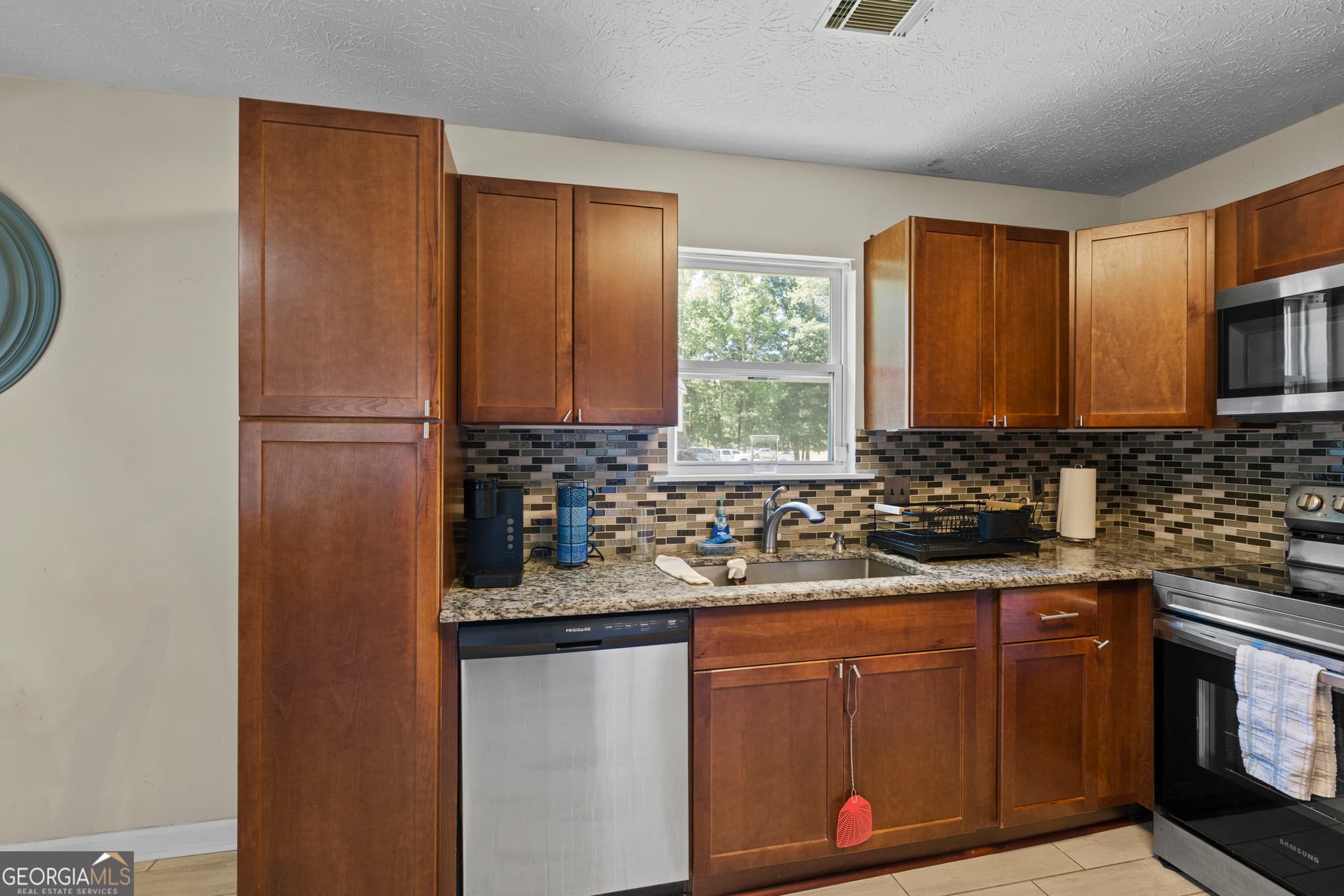 4 bedroom, 2 bathroom, 1,809 sq ft single family residence for sale at 1768 Floye Drive, Loganville, GA 30052 — photo 7