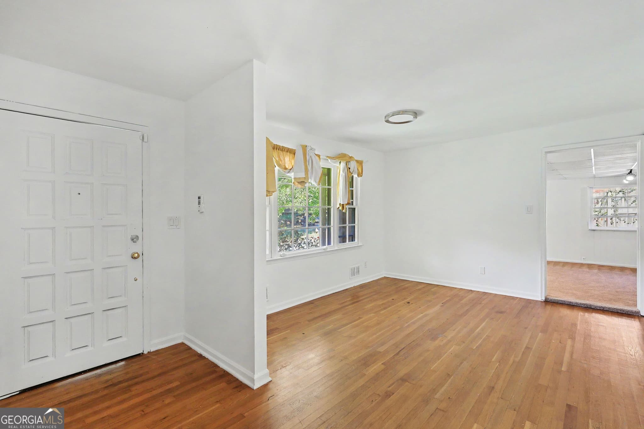 4 bedroom, 3 bathroom, 2,648 sq ft single family residence for sale at 6663 Peacock Boulevard, Morrow, GA 30260 — photo 2