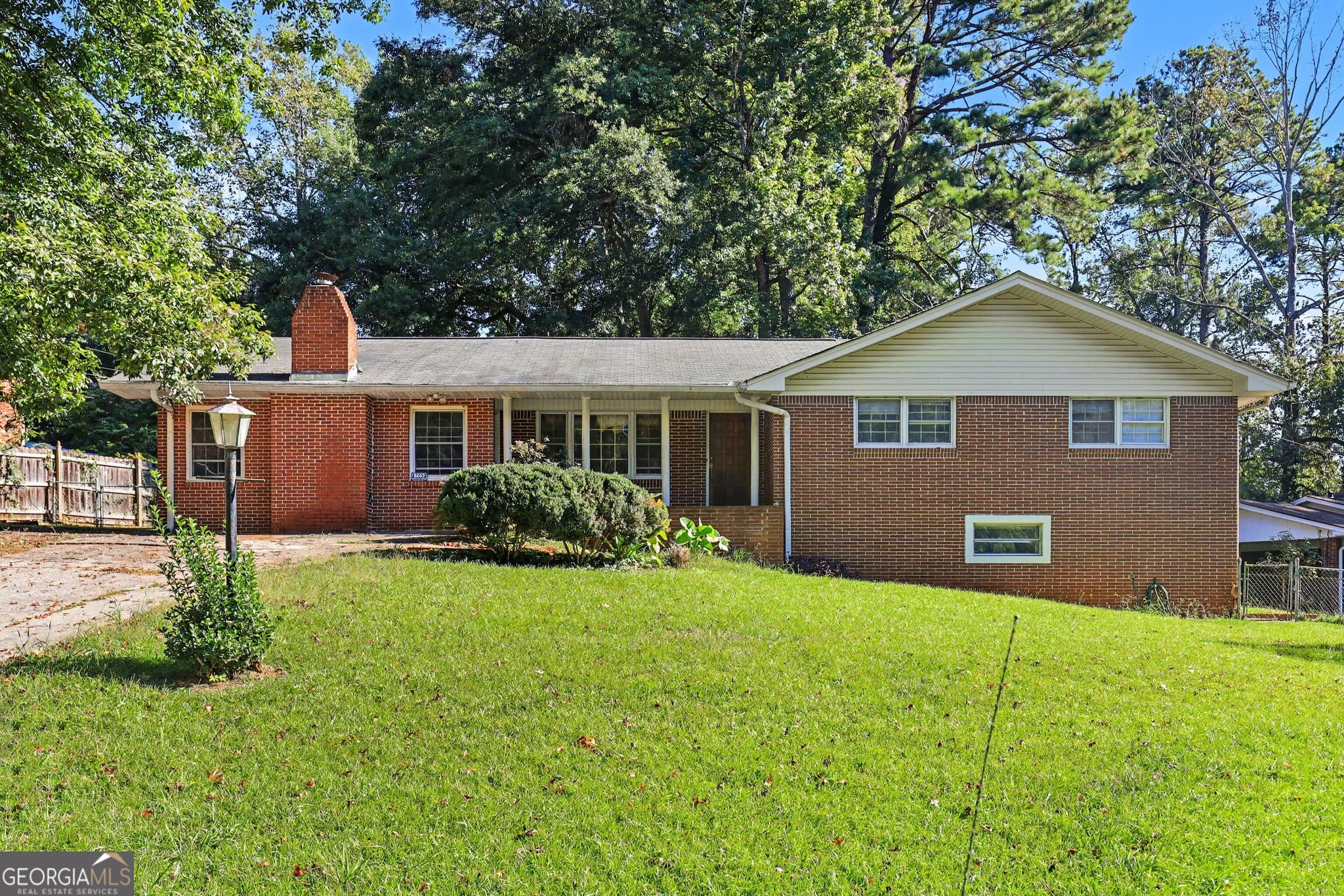 4 bedroom, 3 bathroom, 2,648 sq ft single family residence for sale at 6663 Peacock Boulevard, Morrow, GA 30260 — photo 1 of 10