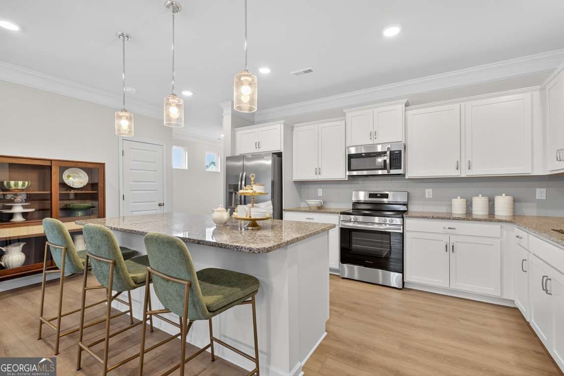 3 bedroom, 2.5 bathroom, 1,912 sq ft townhouse for sale at 827 Crescent Drive 55, Riverdale, GA 30274 — photo 5