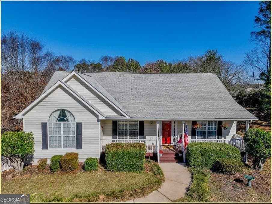 4 bedroom, 3 bathroom, 2,598 sq ft single family residence for sale at 5810 Woodberry Walk, Cumming, GA 30028 — photo 2