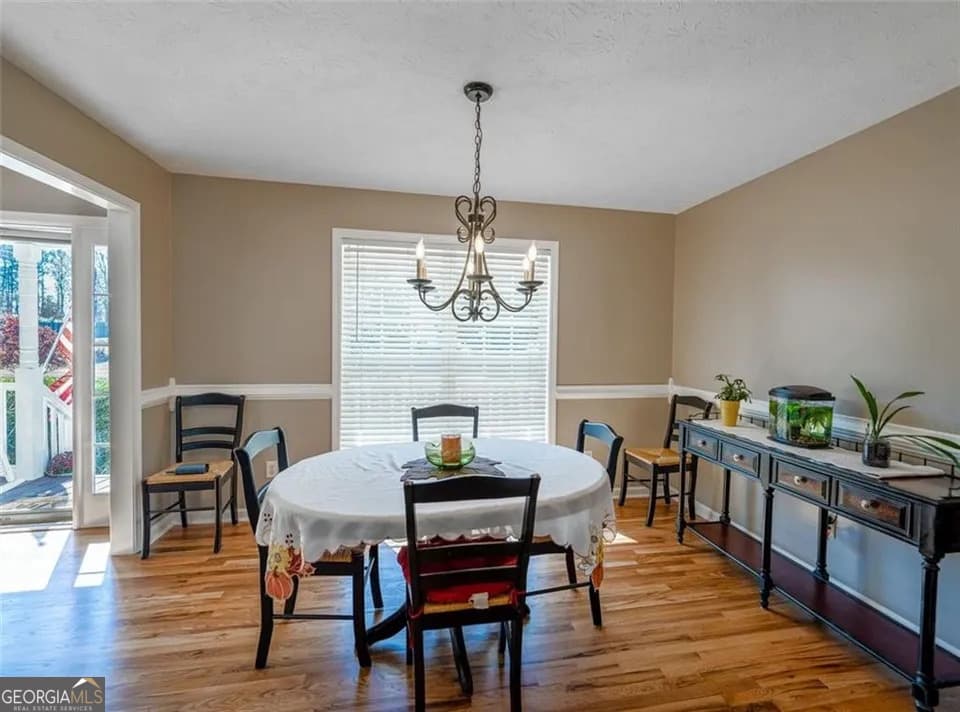4 bedroom, 3 bathroom, 2,598 sq ft single family residence for sale at 5810 Woodberry Walk, Cumming, GA 30028 — photo 6