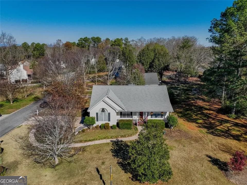 4 bedroom, 3 bathroom, 2,598 sq ft single family residence for sale at 5810 Woodberry Walk, Cumming, GA 30028 — photo 1 of 53