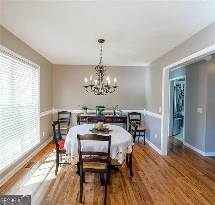 4 bedroom, 3 bathroom, 2,598 sq ft single family residence for sale at 5810 Woodberry Walk, Cumming, GA 30028 — photo 5