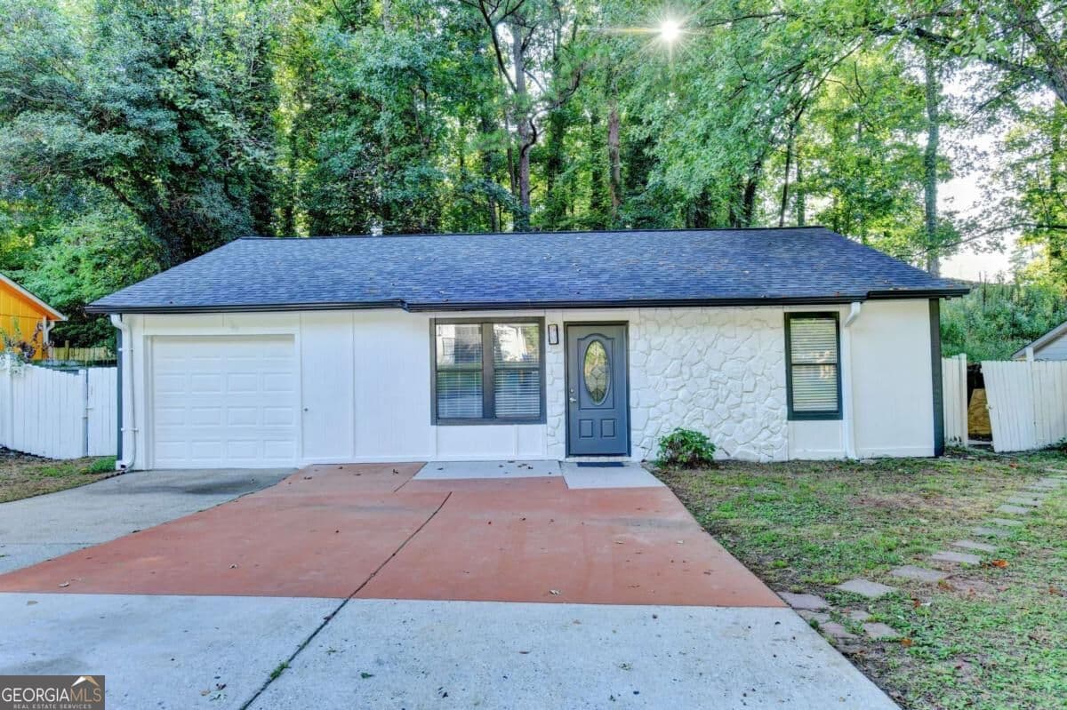 5 bedroom, 3 bathroom, 1,020 sq ft single family residence for sale at 1360 Sugarwood Lane, Norcross, GA 30093 — photo 2