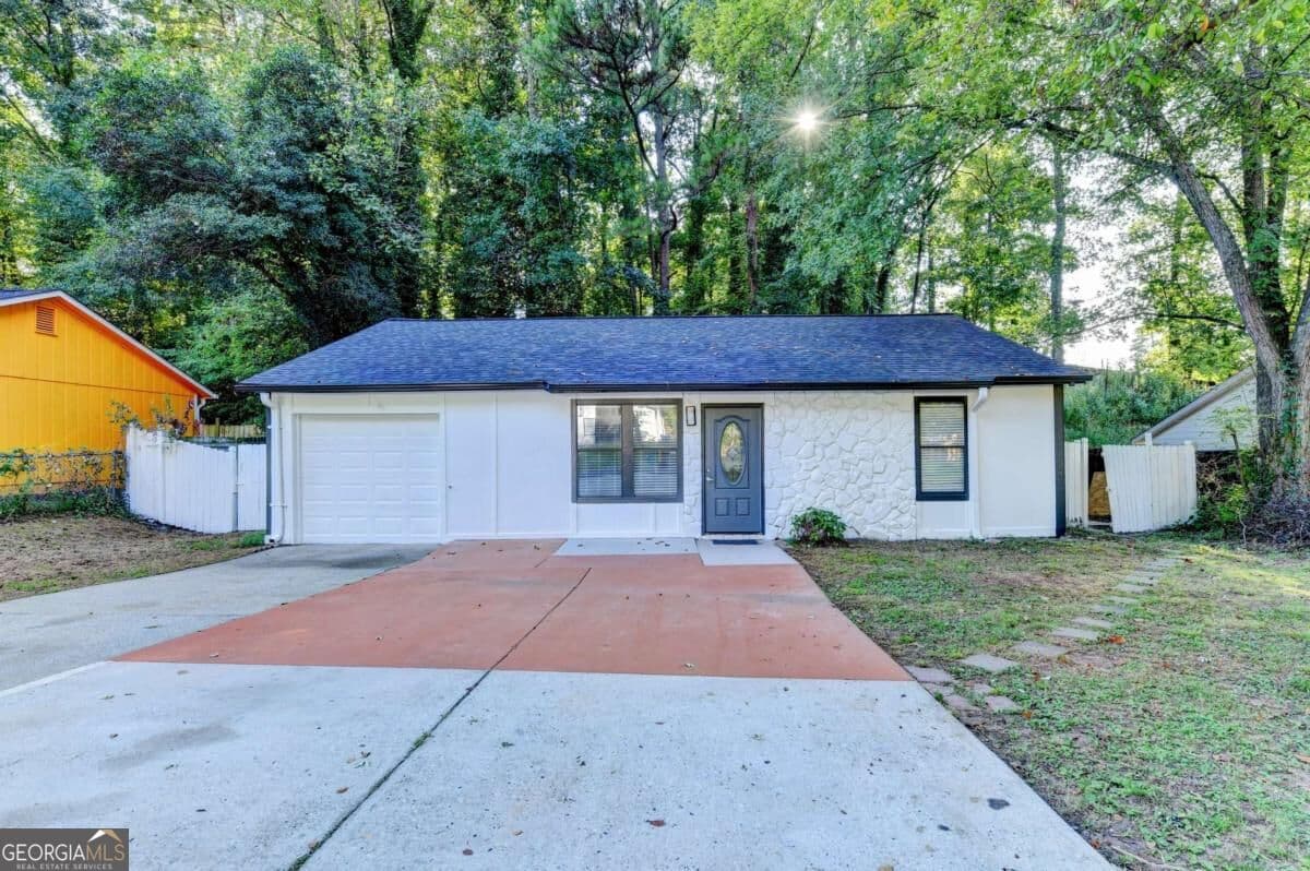 5 bedroom, 3 bathroom, 1,020 sq ft single family residence for sale at 1360 Sugarwood Lane, Norcross, GA 30093 — photo 3
