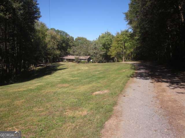 4 bedroom, 3 bathroom, 1,680 sq ft single family residence for sale at 312 Mansfield Road, White, GA 30184 — photo 3