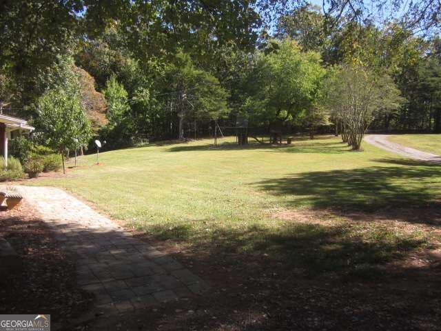 4 bedroom, 3 bathroom, 1,680 sq ft single family residence for sale at 312 Mansfield Road, White, GA 30184 — photo 5