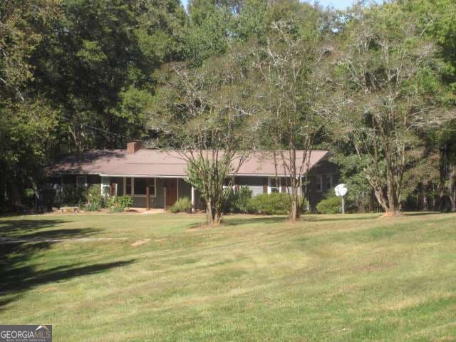 4 bedroom, 3 bathroom, 1,680 sq ft single family residence for sale at 312 Mansfield Road, White, GA 30184 — photo 4