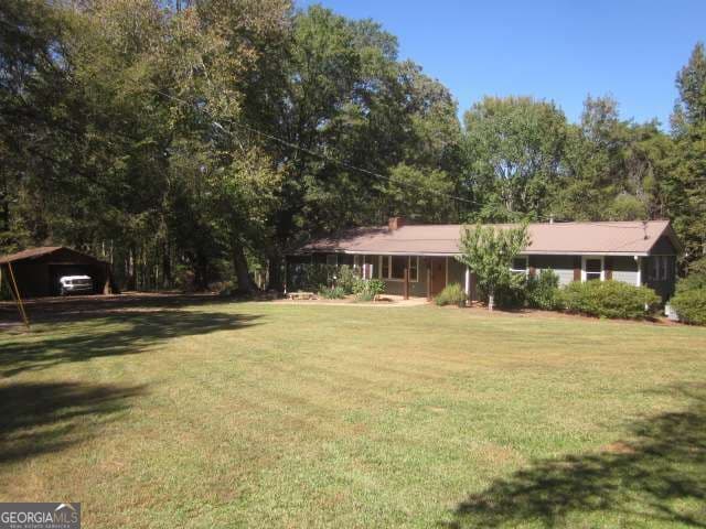 4 bedroom, 3 bathroom, 1,680 sq ft single family residence for sale at 312 Mansfield Road, White, GA 30184 — photo 8