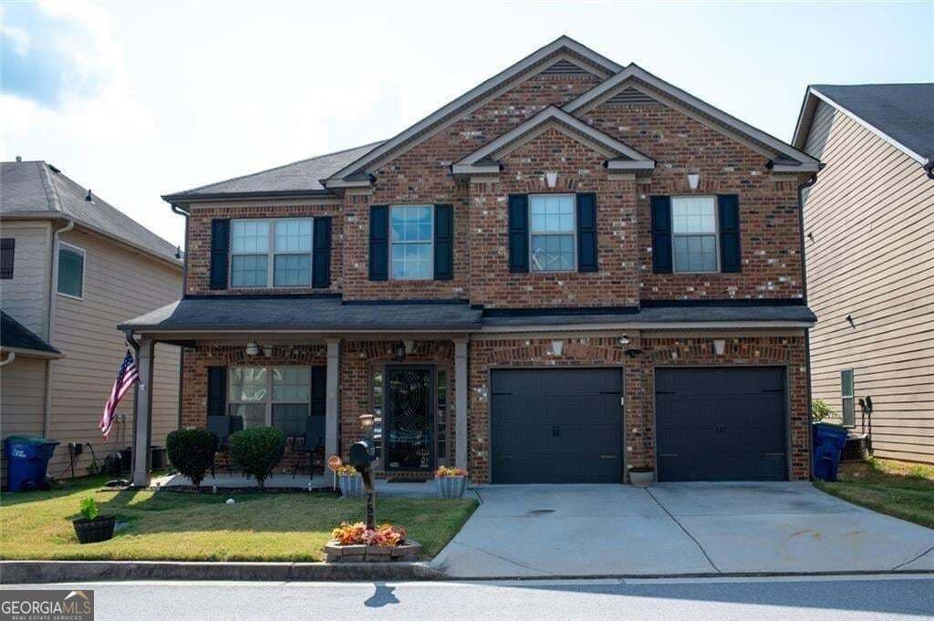 4 bedroom, 2.5 bathroom, 2,612 sq ft single family residence for sale at 7579 Crawford Court, Fairburn, GA 30213 — photo 1 of 28