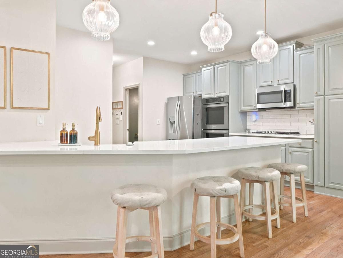 4 bedroom, 3.5 bathroom, 3,201 sq ft single family residence for sale at 1038 Boxwood Lane, Canton, GA 30114 — photo 3