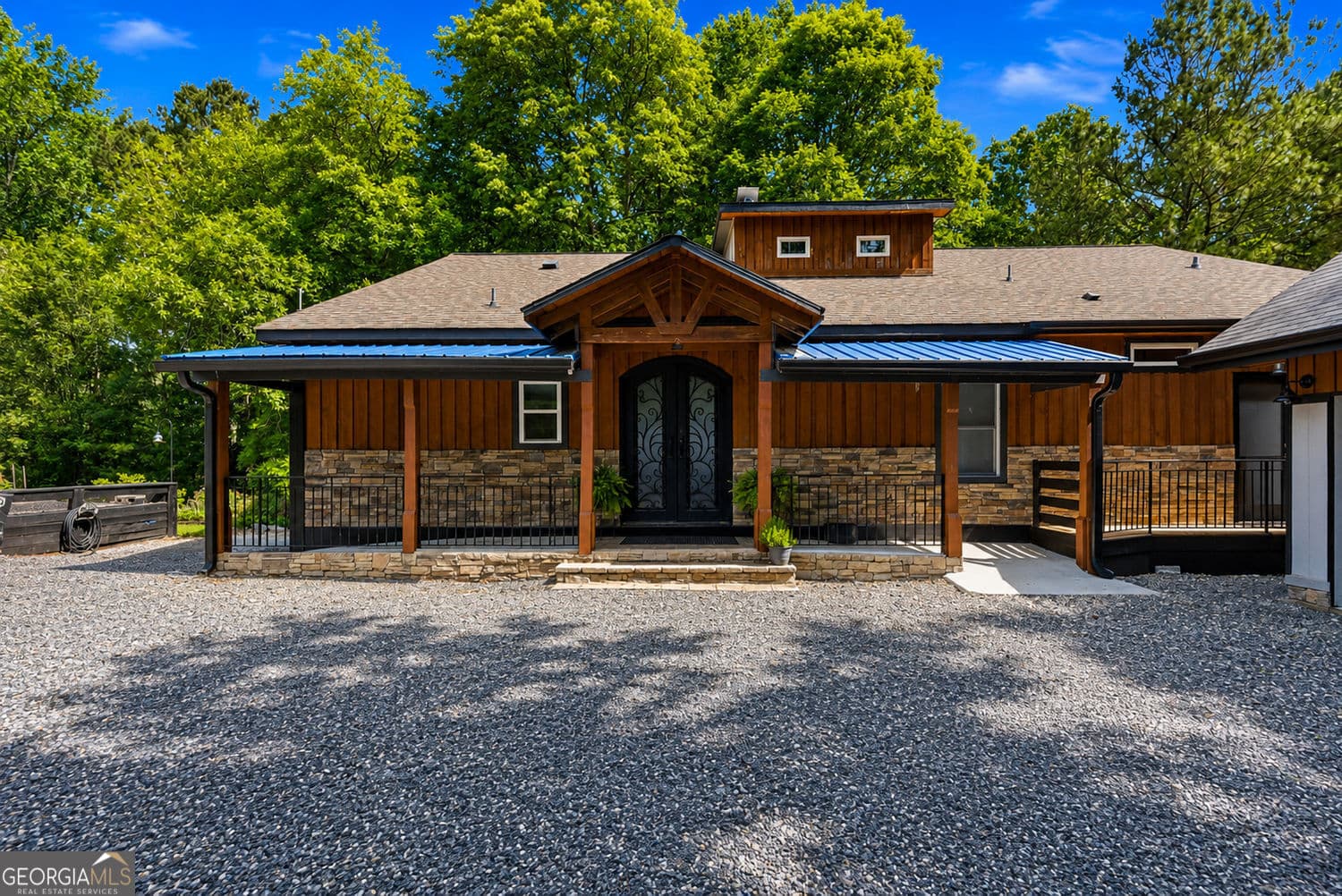4 bedroom, 3.5 bathroom, 5,040 sq ft single family residence for sale at 200 McClure Drive, Cumming, GA 30028 — photo 2