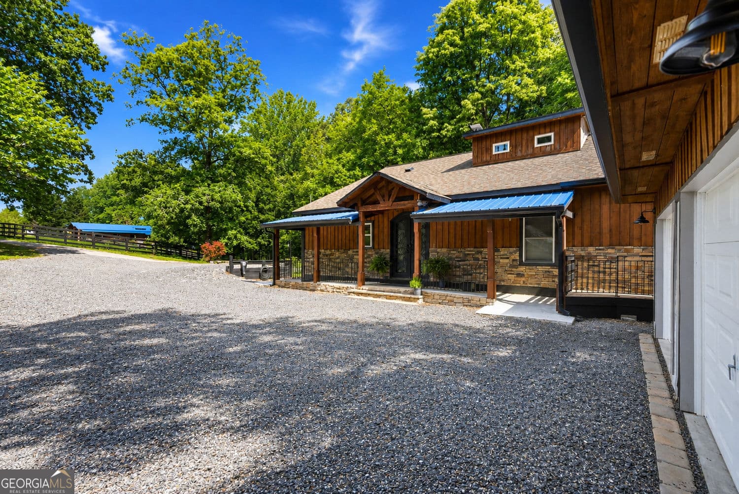 4 bedroom, 3.5 bathroom, 5,040 sq ft single family residence for sale at 200 McClure Drive, Cumming, GA 30028 — photo 3