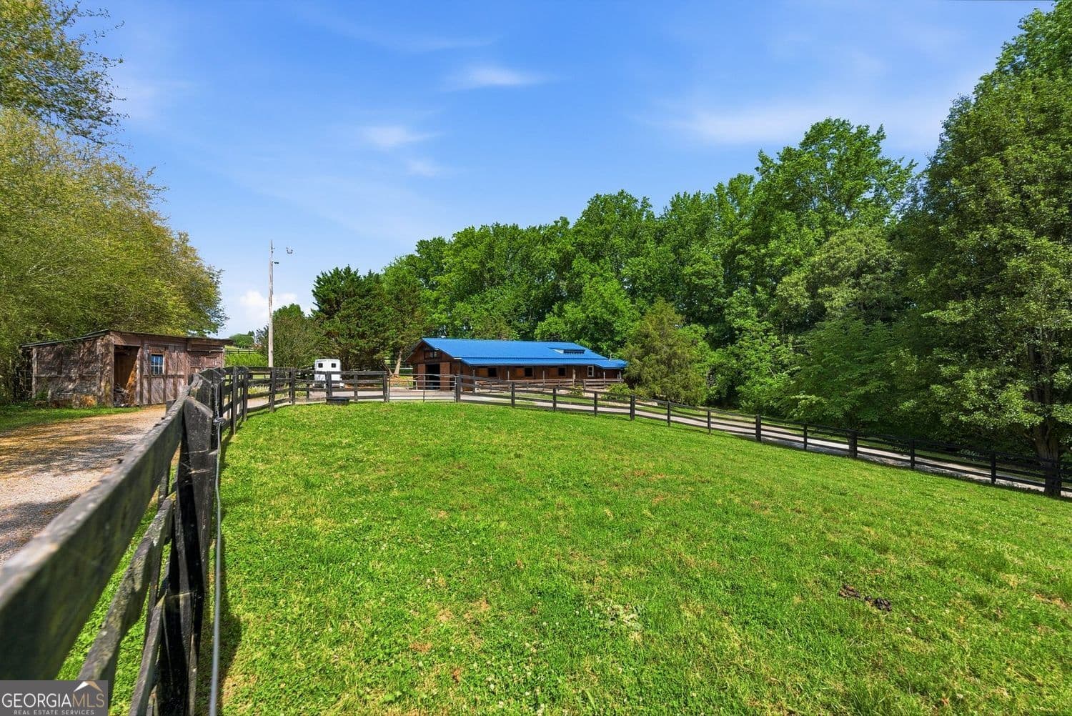4 bedroom, 3.5 bathroom, 5,040 sq ft single family residence for sale at 200 McClure Drive, Cumming, GA 30028 — photo 5