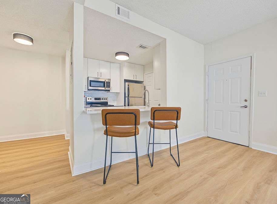 1 bedroom, 1 bathroom, 730 sq ft condominium for sale at 1075 Peachtree Walk A301, Atlanta, GA 30309 — photo 2