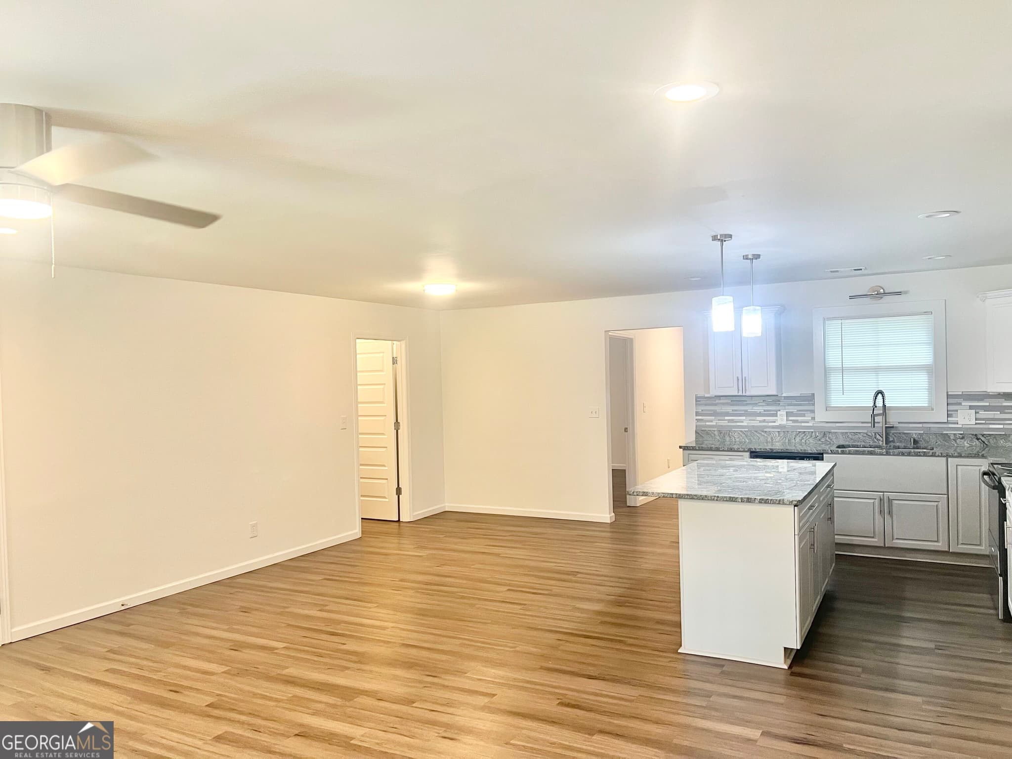 5 bedroom, 3 bathroom, 2,204 sq ft single family residence for sale at 5712 Attucks Boulevard, Morrow, GA 30260 — photo 2