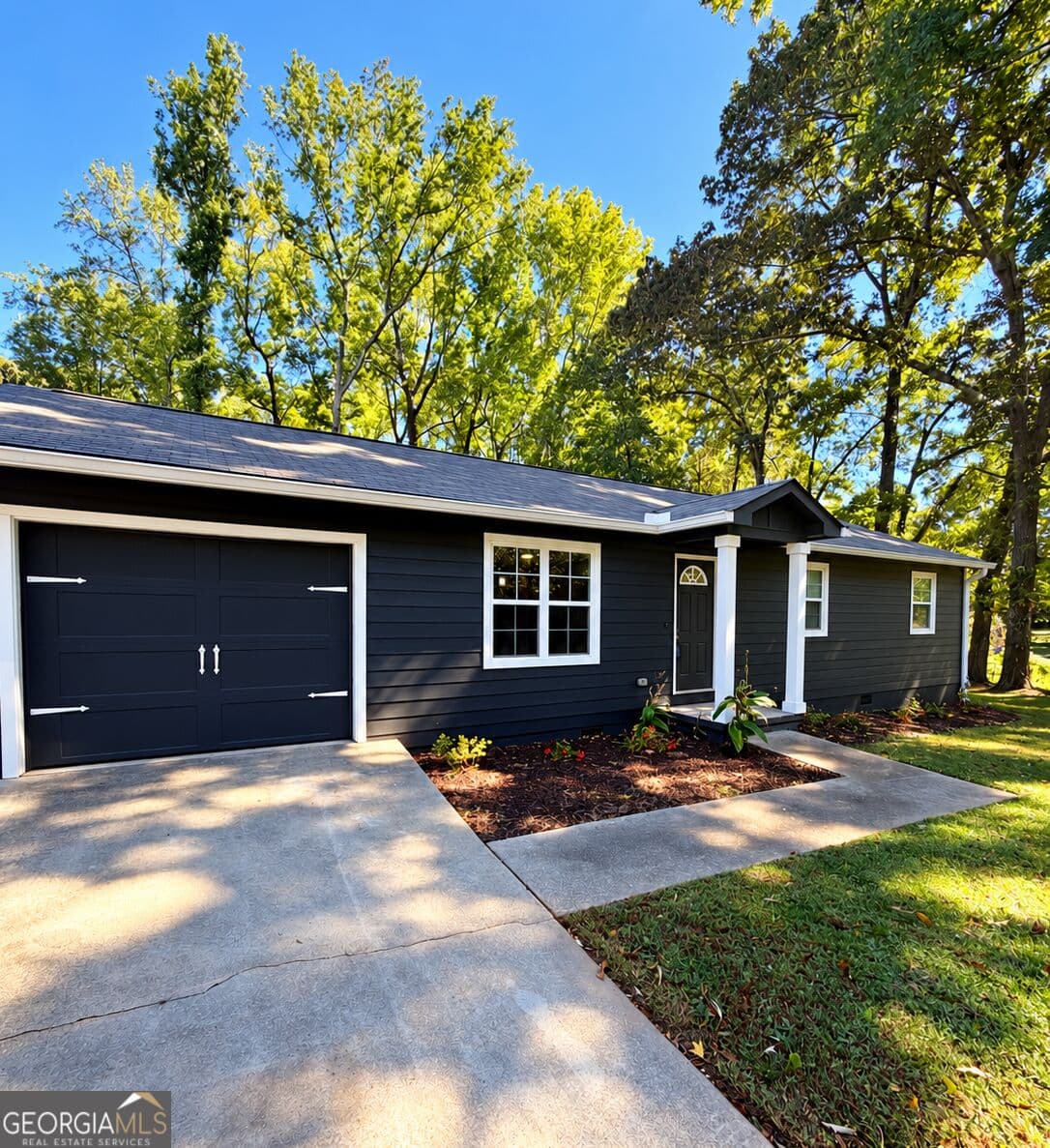 5 bedroom, 3 bathroom, 2,204 sq ft single family residence for sale at 5712 Attucks Boulevard, Morrow, GA 30260 — photo 1 of 12
