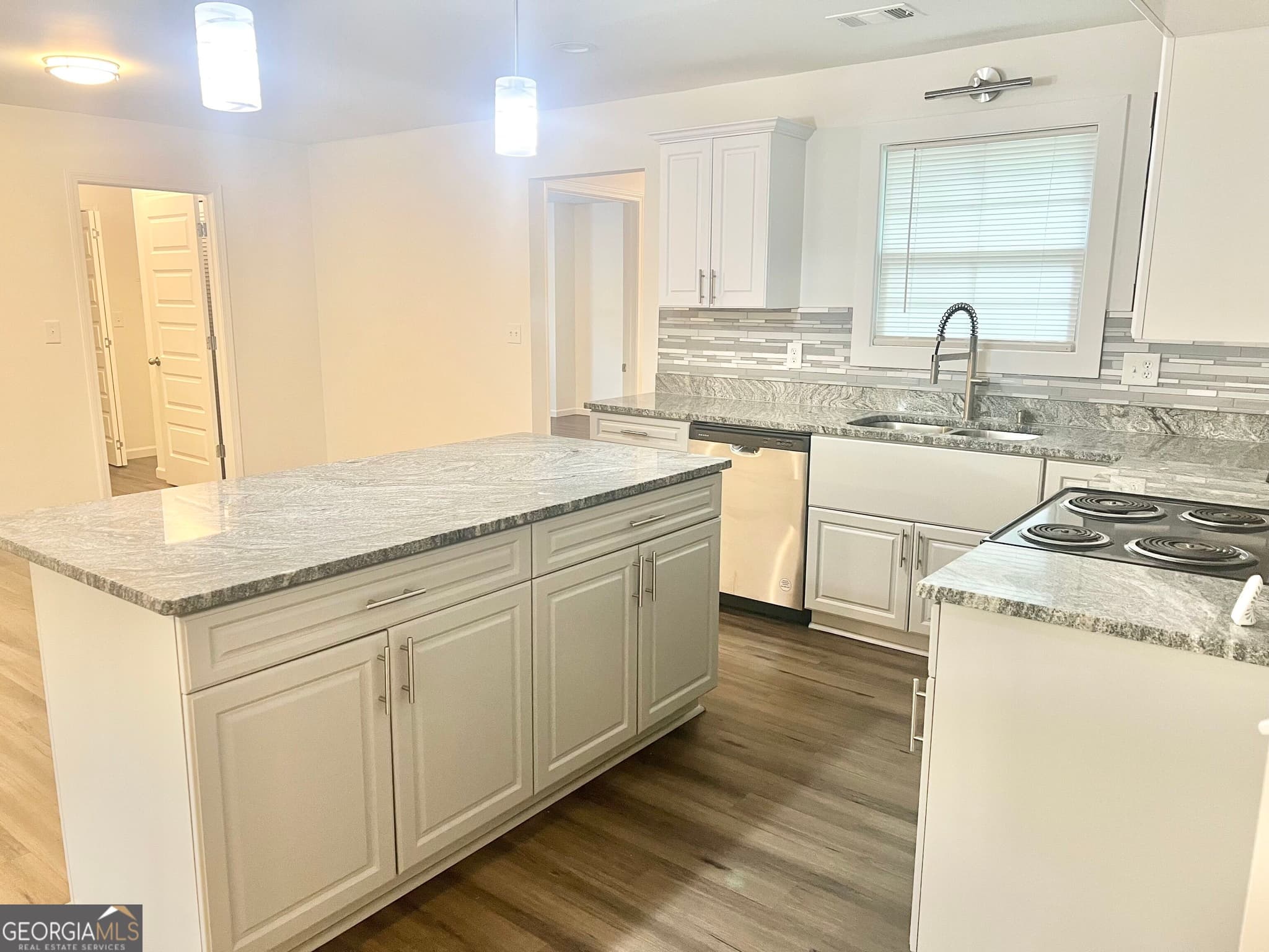 5 bedroom, 3 bathroom, 2,204 sq ft single family residence for sale at 5712 Attucks Boulevard, Morrow, GA 30260 — photo 5