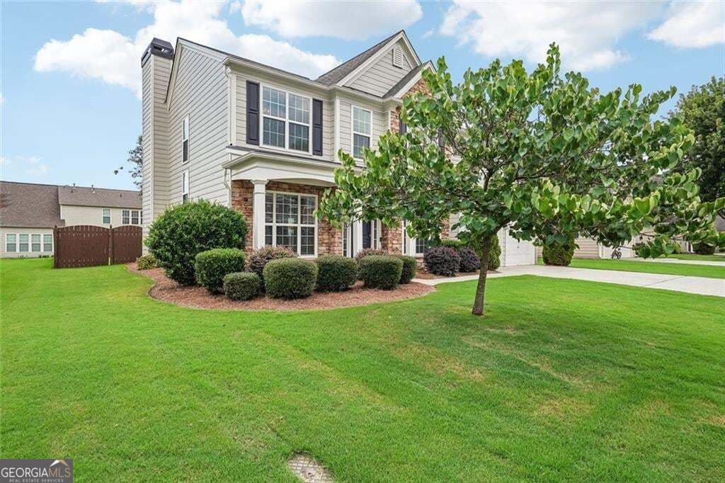4 bedroom, 2.5 bathroom, 2,288 sq ft single family residence for sale at 8080 Friarbridge Drive, Suwanee, GA 30024 — photo 6