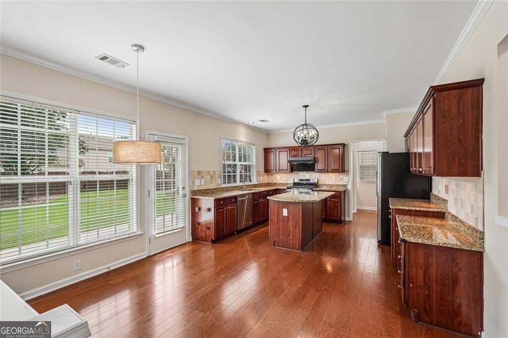 4 bedroom, 2.5 bathroom, 2,288 sq ft single family residence for sale at 8080 Friarbridge Drive, Suwanee, GA 30024 — photo 3