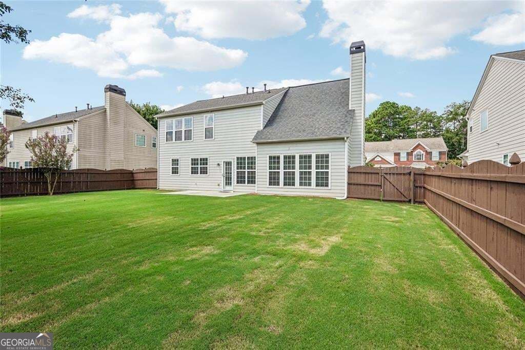4 bedroom, 2.5 bathroom, 2,288 sq ft single family residence for sale at 8080 Friarbridge Drive, Suwanee, GA 30024 — photo 4