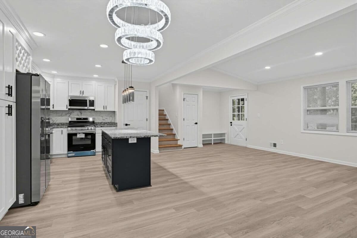 4 bedroom, 3 bathroom single family residence for sale at 70 Hager Drive, Riverdale, GA 30274 — photo 6