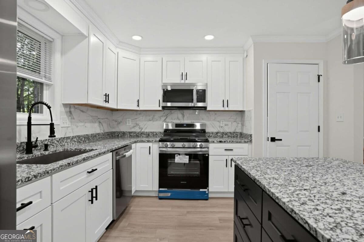 4 bedroom, 3 bathroom single family residence for sale at 70 Hager Drive, Riverdale, GA 30274 — photo 9