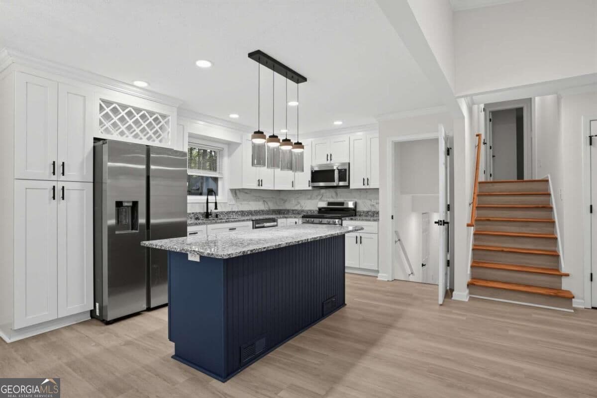4 bedroom, 3 bathroom single family residence for sale at 70 Hager Drive, Riverdale, GA 30274 — photo 8