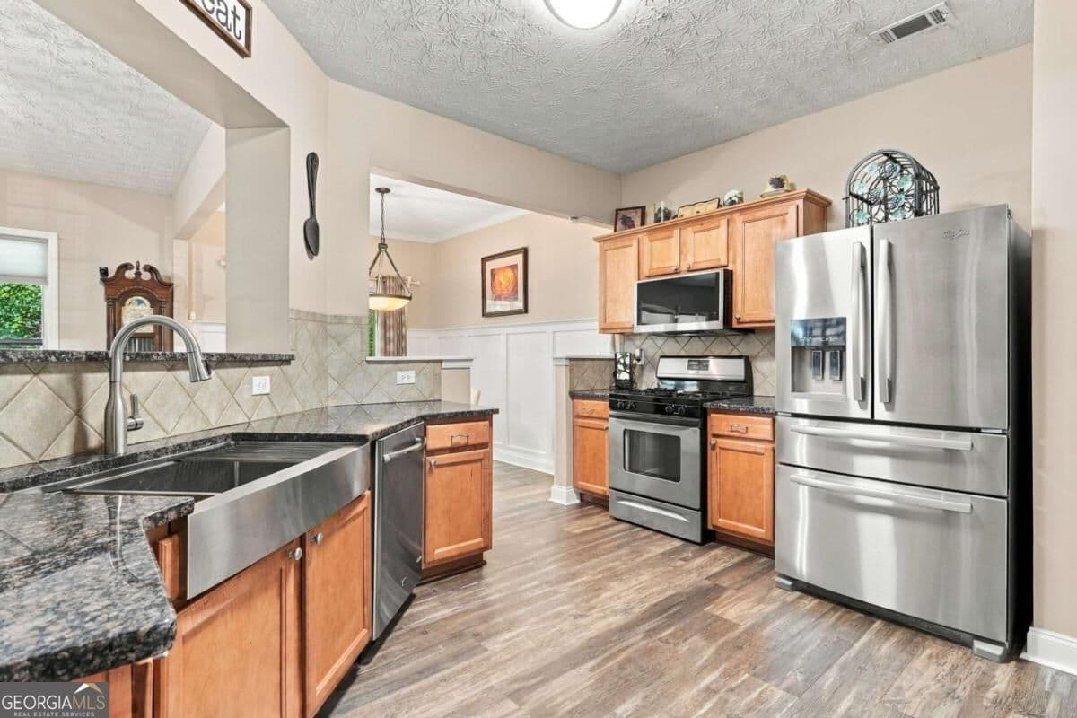 4 bedroom, 3.5 bathroom, 1,888 sq ft single family residence for sale at 236 Winterbury Drive, Canton, GA 30114 — photo 9