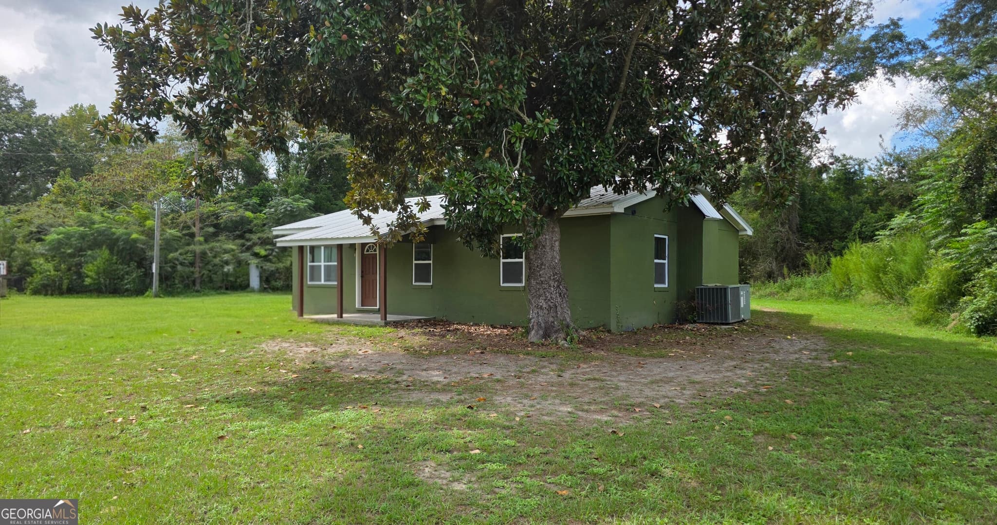 3 bedroom, 1 bathroom, 1,107 sq ft single family residence for sale at 2385 Ga Highway 117, Rentz, GA 31075 — photo 2