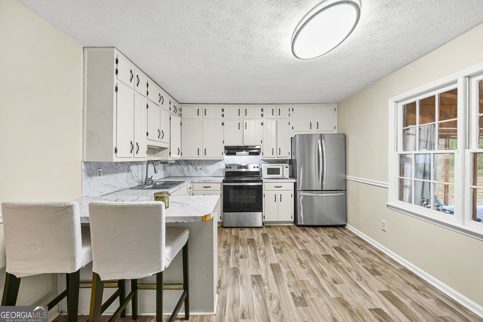 3 bedroom, 2 bathroom, 1,164 sq ft single family residence for sale at 2456 Verner Road, Lawrenceville, GA 30043 — photo 6