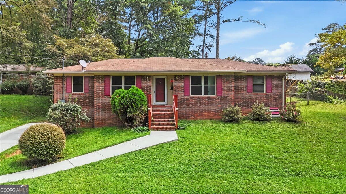 4 bedroom, 2 bathroom, 1,377 sq ft single family residence for sale at 2913 Vogue Drive, Douglasville, GA 30134 — photo 2