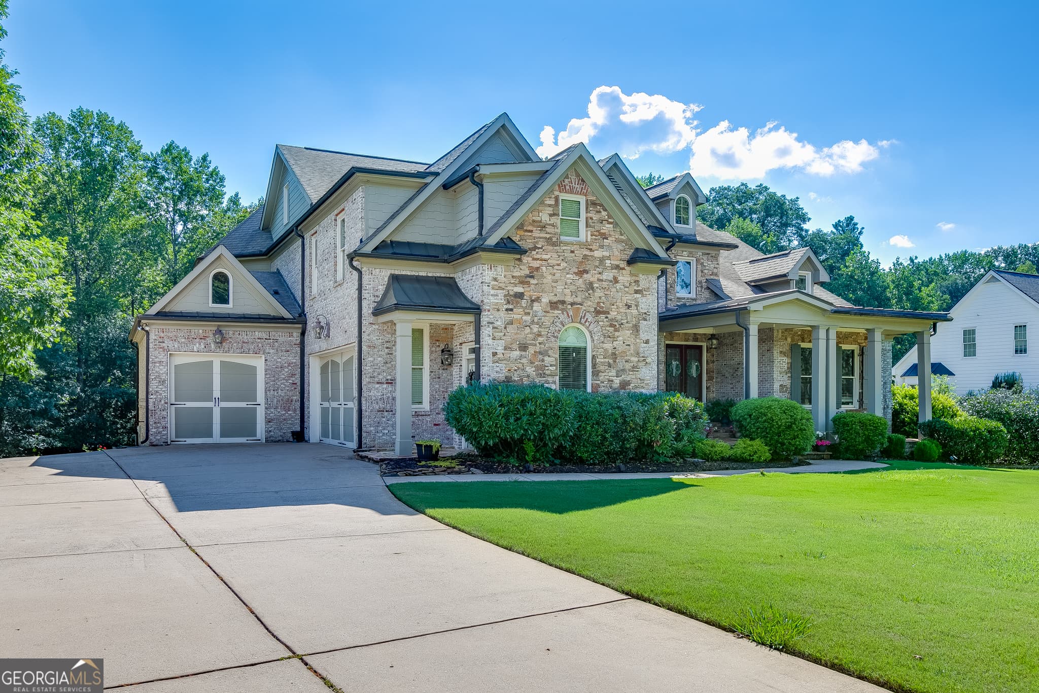6 bedroom, 5.5 bathroom, 6,046 sq ft single family residence for sale at 1373 Mountain Lake Drive, Auburn, GA 30011 — photo 3