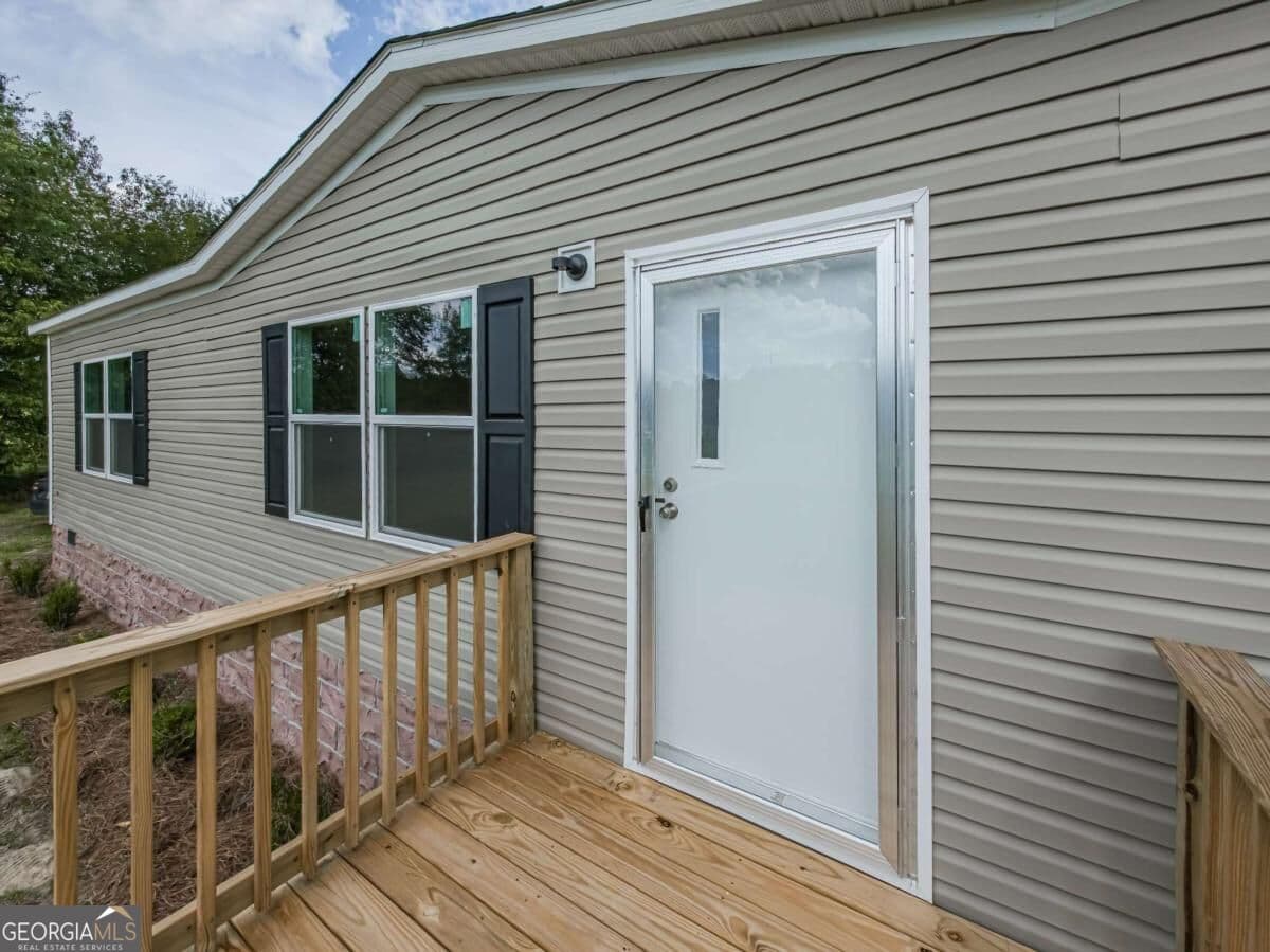 5 bedroom, 2 bathroom, 2,001 sq ft manufactured home,single family residence for sale at 201 Meadow Hill Lane, Ocilla, GA 31774 — photo 6