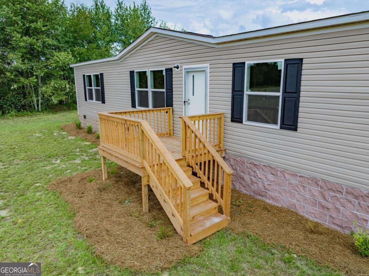 5 bedroom, 2 bathroom, 2,001 sq ft manufactured home,single family residence for sale at 201 Meadow Hill Lane, Ocilla, GA 31774 — photo 5