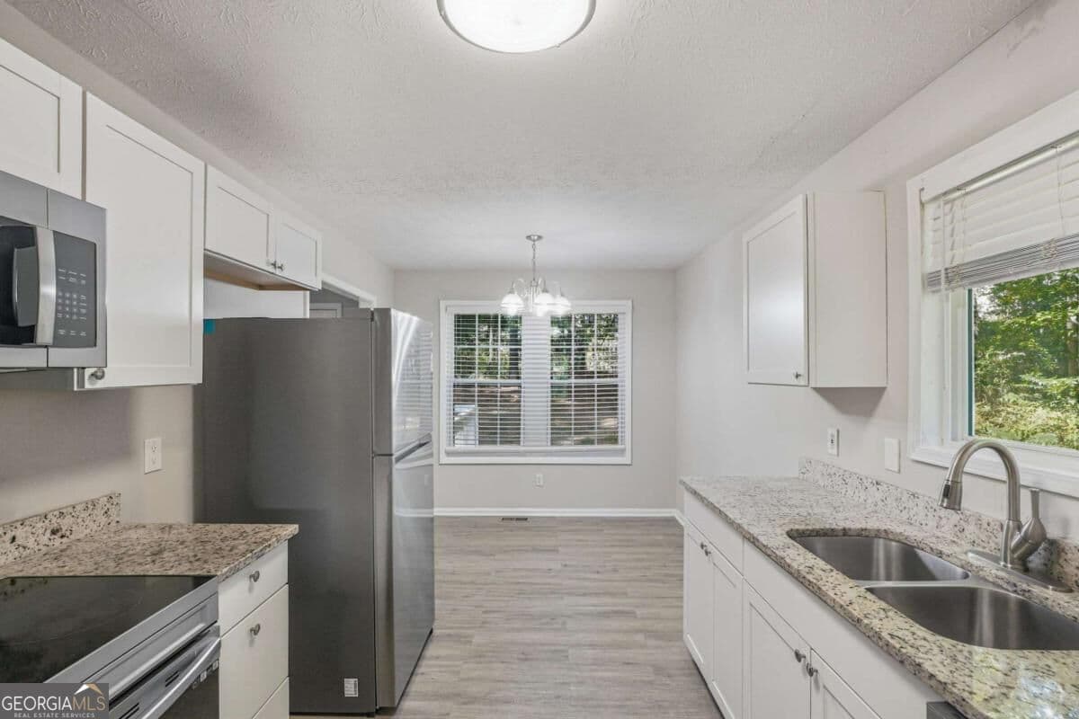 4 bedroom, 2 bathroom, 2,768 sq ft single family residence for sale at 5088 Heritage Valley Drive, Douglasville, GA 30135 — photo 7