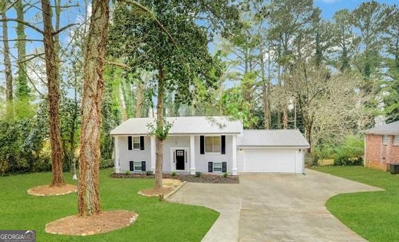 5 bedroom, 2 bathroom, 1,820 sq ft single family residence for sale at 3363 Wesley Chapel Road, Decatur, GA 30034 — photo 1 of 21