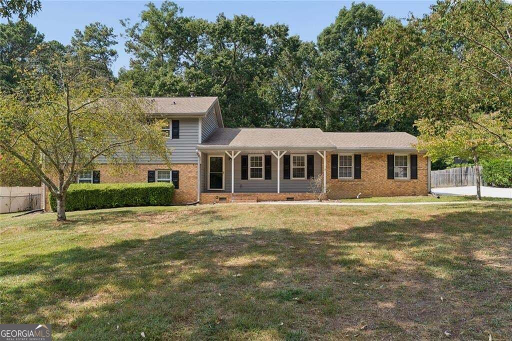 4 bedroom, 3 bathroom, 2,271 sq ft single family residence for sale at 2119 Eastwood Drive, Snellville, GA 30078 — photo 1 of 56