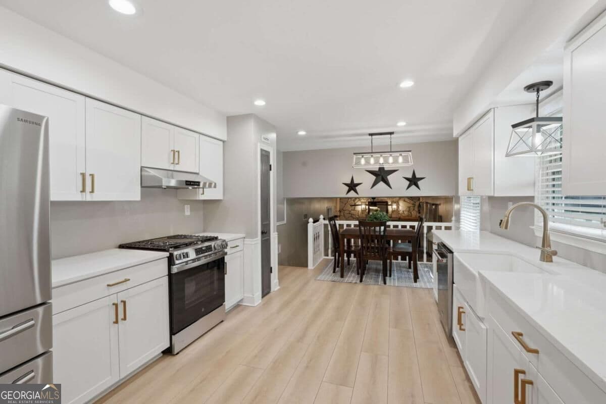 4 bedroom, 2.5 bathroom, 2,116 sq ft single family residence for sale at 451 Little John Drive, Lilburn, GA 30047 — photo 8