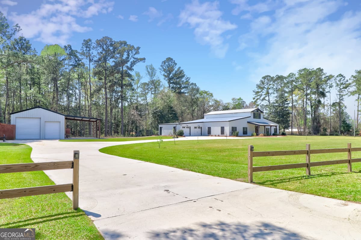 5 bedroom, 3.5 bathroom, 5,775 sq ft single family residence for sale at 3064 Little McCall Road, Rincon, GA 31326 — photo 6