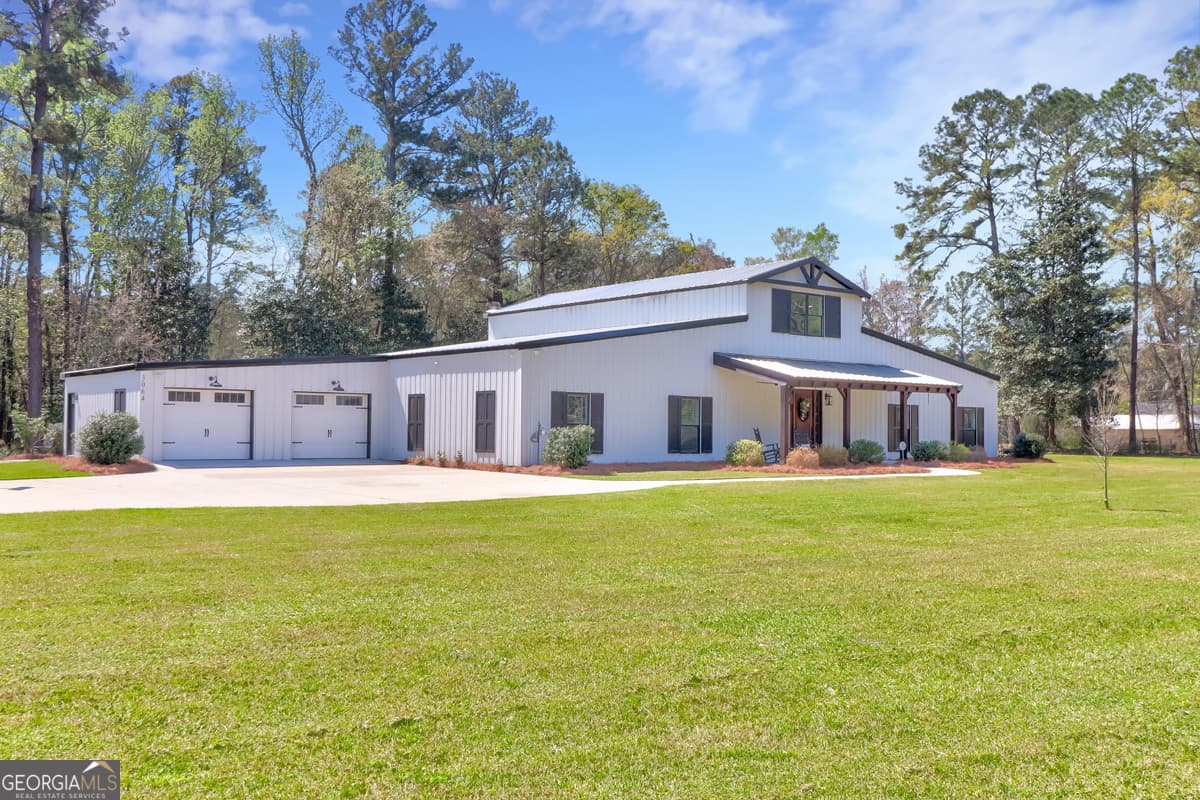 5 bedroom, 3.5 bathroom, 5,775 sq ft single family residence for sale at 3064 Little McCall Road, Rincon, GA 31326 — photo 7