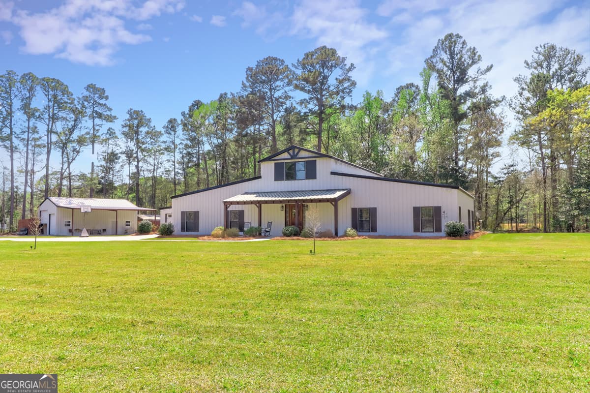5 bedroom, 3.5 bathroom, 5,775 sq ft single family residence for sale at 3064 Little McCall Road, Rincon, GA 31326 — photo 3