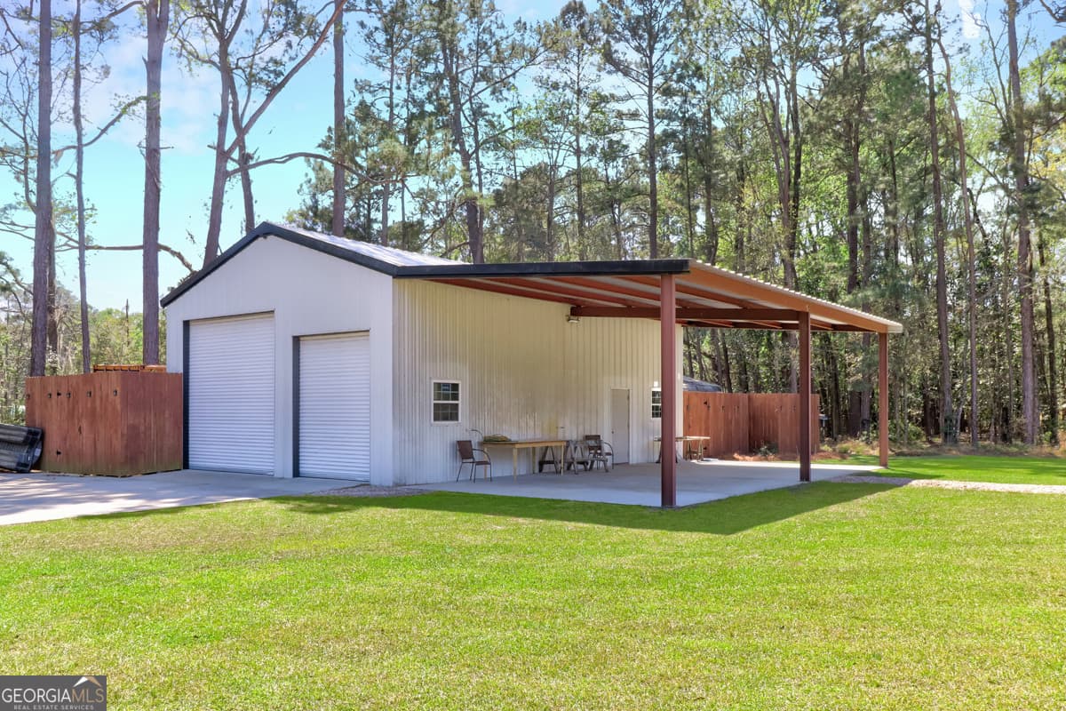 5 bedroom, 3.5 bathroom, 5,775 sq ft single family residence for sale at 3064 Little McCall Road, Rincon, GA 31326 — photo 9