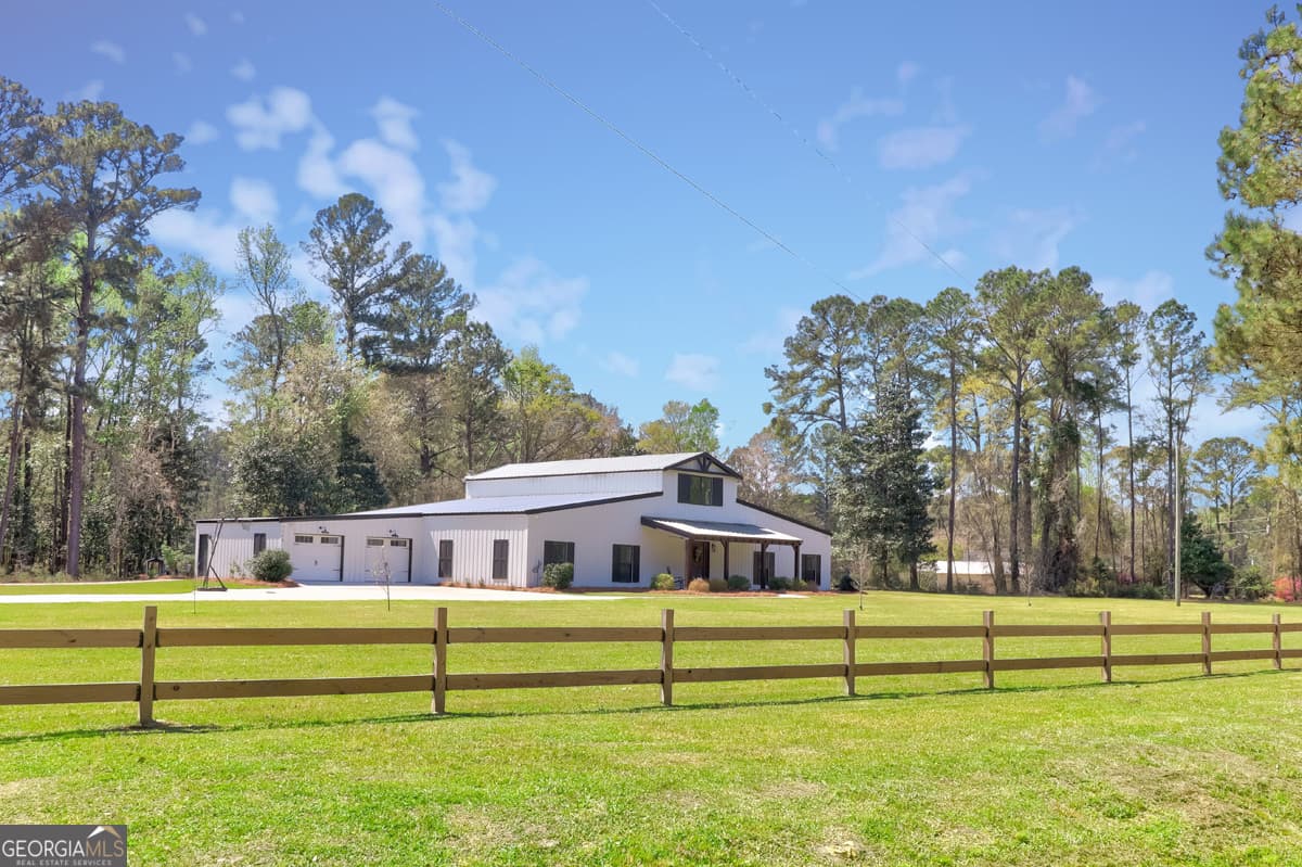 5 bedroom, 3.5 bathroom, 5,775 sq ft single family residence for sale at 3064 Little McCall Road, Rincon, GA 31326 — photo 4