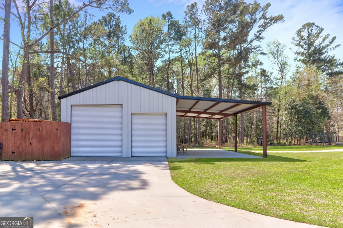 5 bedroom, 3.5 bathroom, 5,775 sq ft single family residence for sale at 3064 Little McCall Road, Rincon, GA 31326 — photo 8