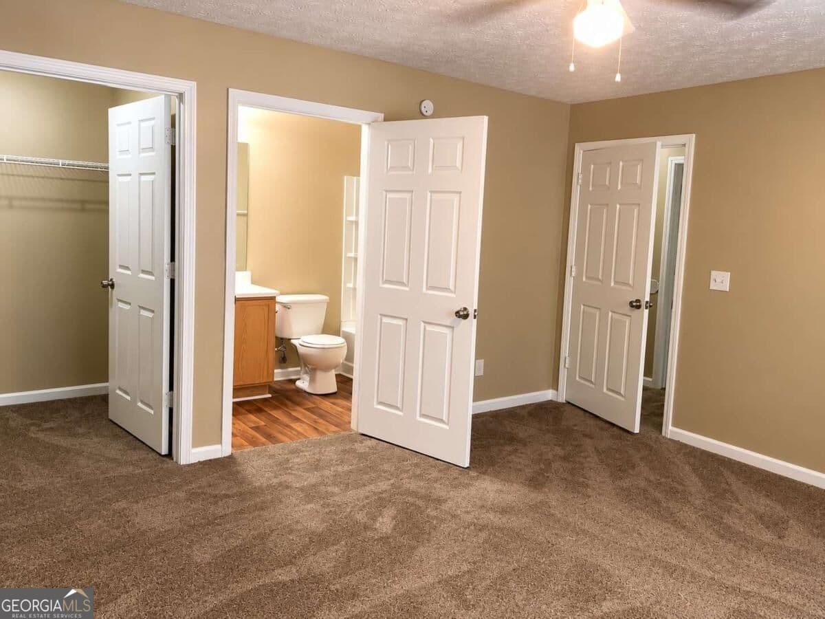 3 bedroom, 2 bathroom, 1,202 sq ft condominium for sale at 4103 Par Three Way, Lithonia, GA 30038 — photo 7