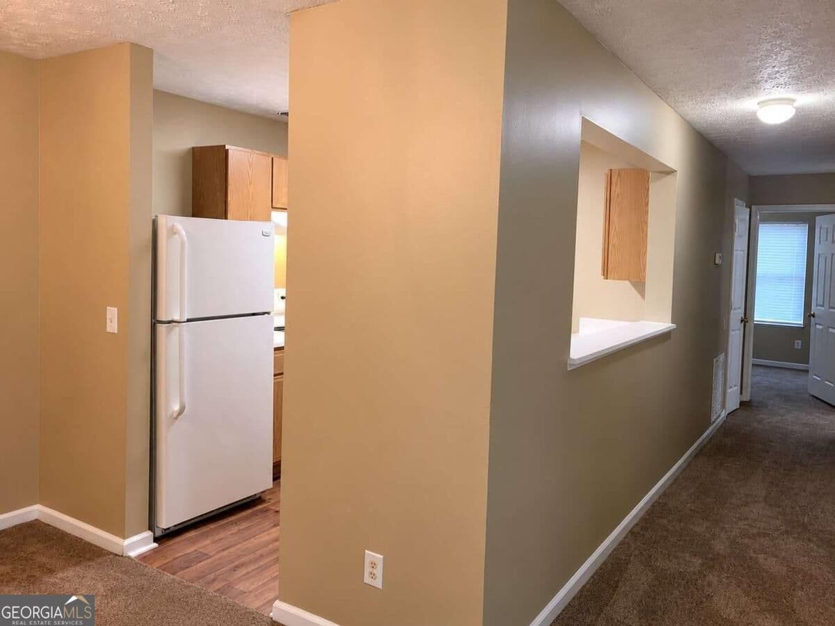 3 bedroom, 2 bathroom, 1,202 sq ft condominium for sale at 4103 Par Three Way, Lithonia, GA 30038 — photo 3